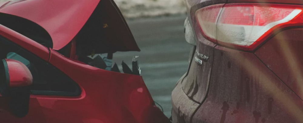 https://unsplash.com/photos/a-red-car-parked-next-to-another-red-car-EA8VsPWhhrY