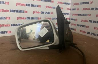 VW POLO 1999 passenger electric white marks wing door mirror