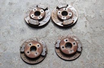 FORD FIESTA MK7 ST180 FRONT AND REAR GROOVED BRAKE DISCS AND PADS 2013-17 BG16