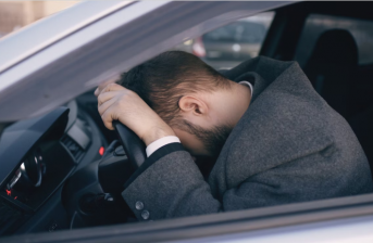https://unsplash.com/photos/man-resting-head-on-steering-wheel-inside-car-W4Ve9gOmykY
