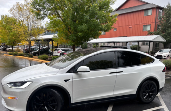 https://www.pexels.com/photo/white-electric-suv-parked-on-rainy-day-in-seattle-28772164/ https://www.pexels.com/photo/white-electric-suv-parked-on-rainy-day-in-seattle-28772164/