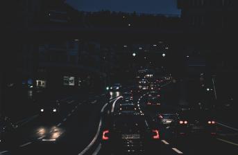 Cars driving on a motorway at night Cars driving on a motorway at night with their lights on