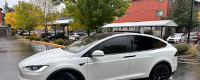  https://www.pexels.com/photo/white-electric-suv-parked-on-rainy-day-in-seattle-28772164/